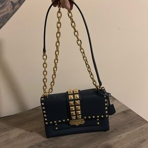 Michael Kors Navy and gold purse